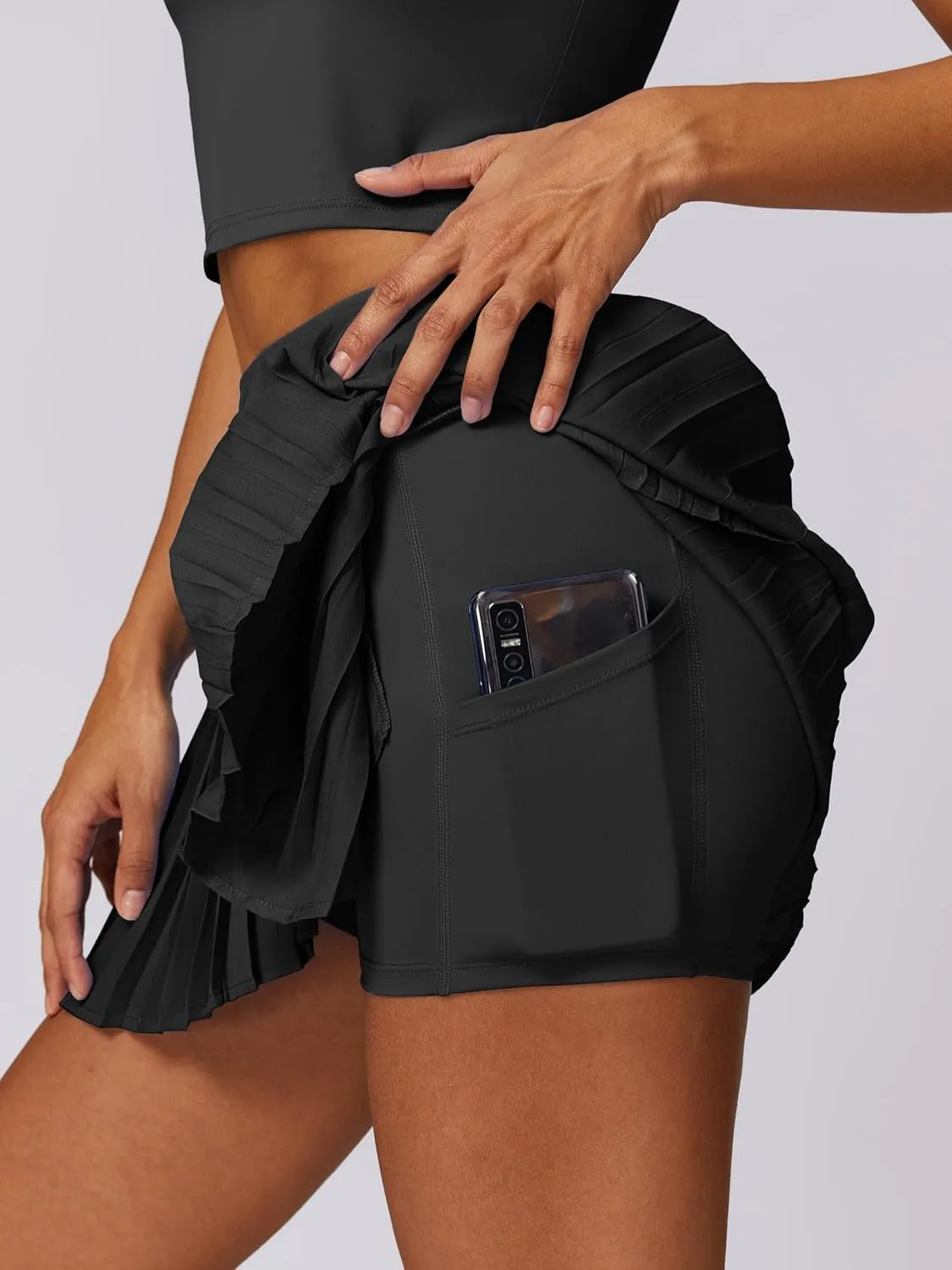 ABOCIW Womens Pleated Tennis Skirt with Shorts Pockets Irregular Layered High Waist Athletic Workout Golf Skorts Skirts