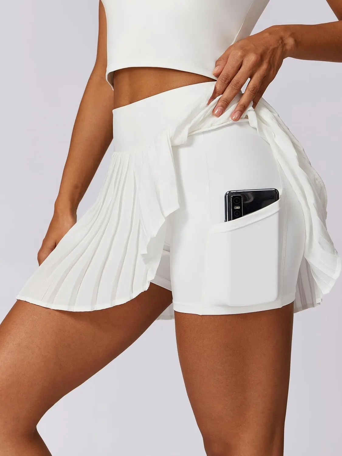 ABOCIW Womens Pleated Tennis Skirt with Shorts Pockets Irregular Layered High Waist Athletic Workout Golf Skorts Skirts