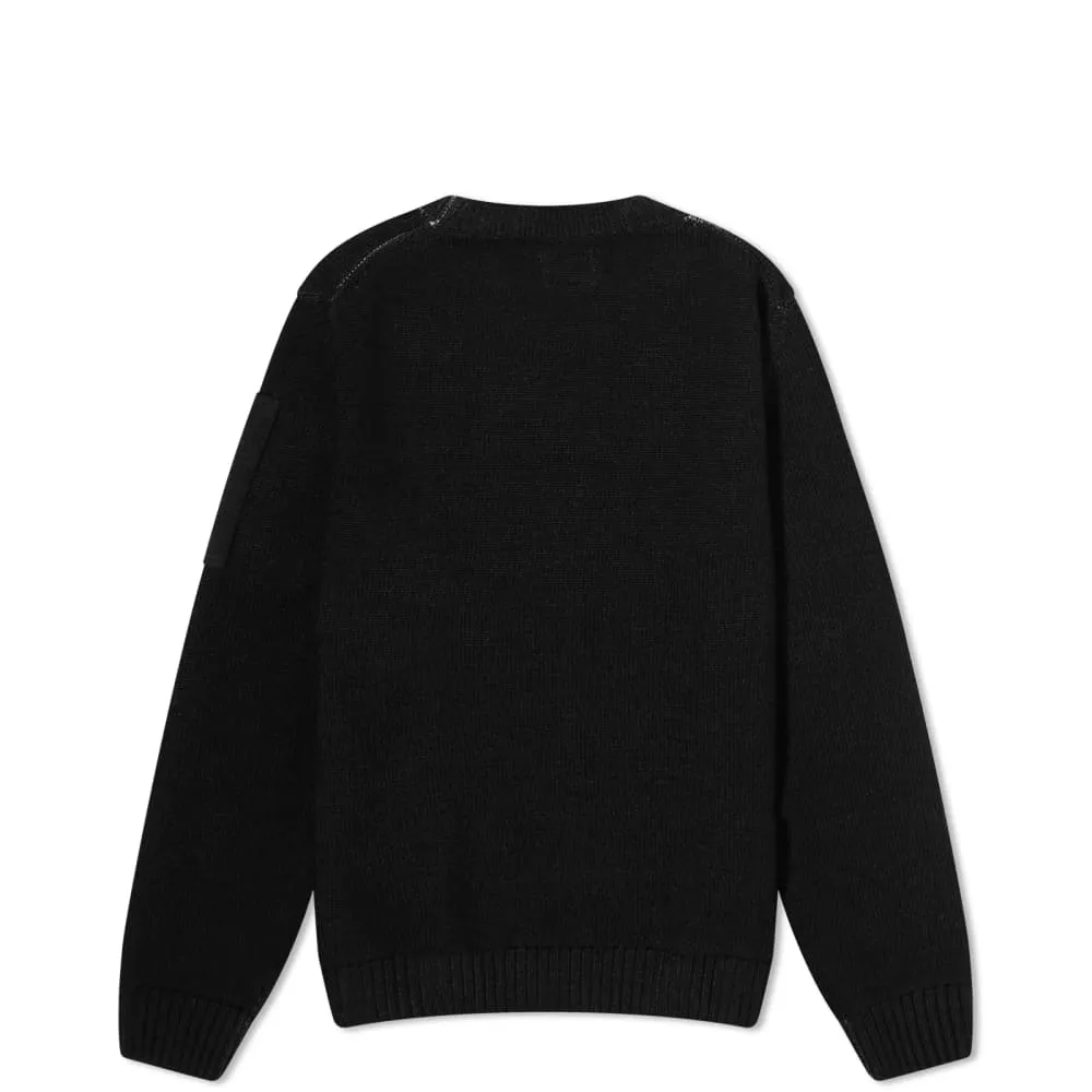 C. Company Merino wool jersey for children under sixteen years old, black
