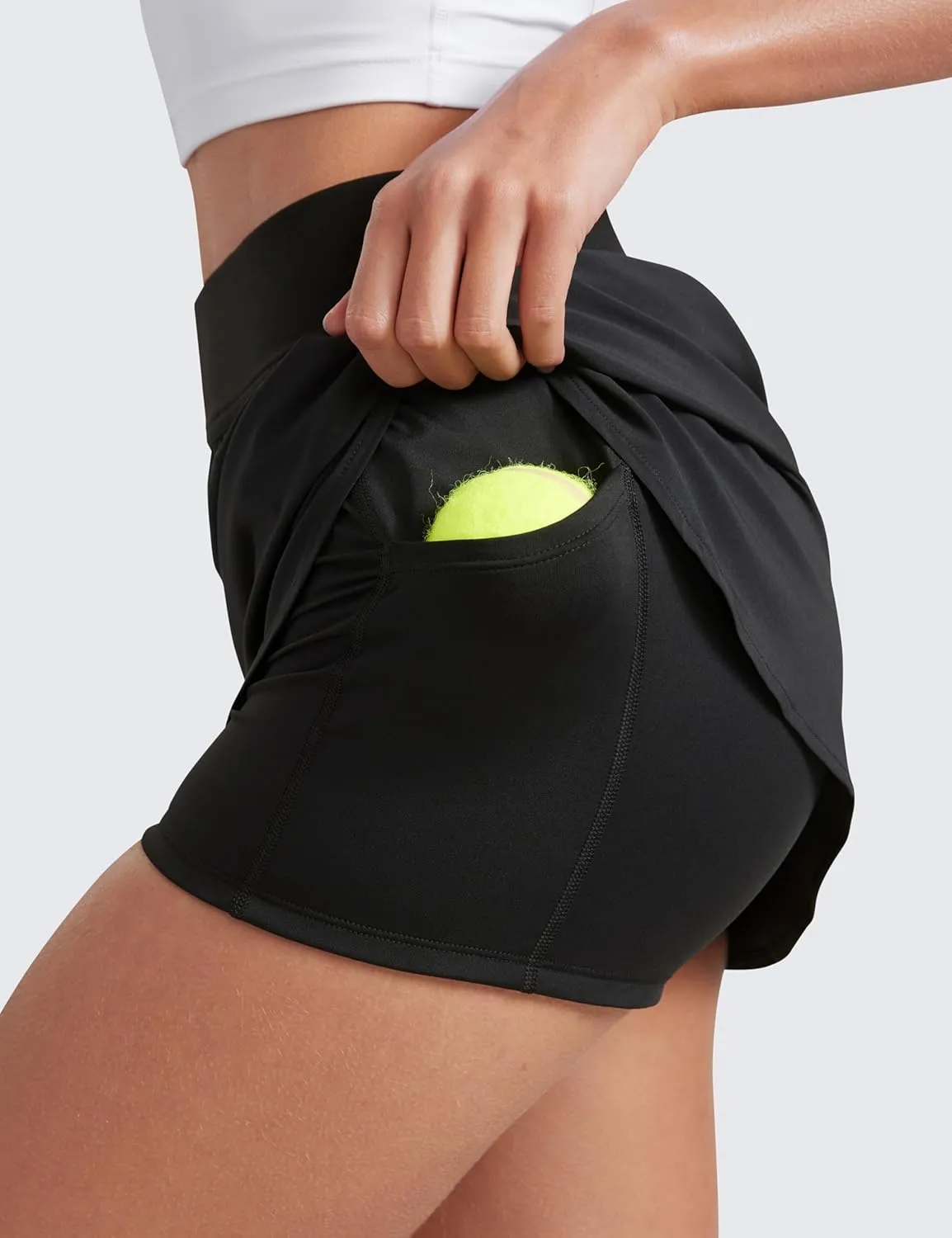 CRZ YOGA Dolphin Golf Skirts for Women A Line High Waisted Casual Athletic Mini Tennis Pickleball Skort with Zipper Pocket
