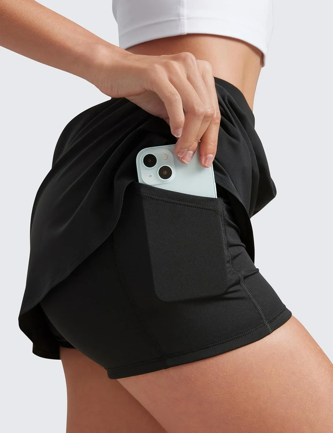 CRZ YOGA Dolphin Golf Skirts for Women A Line High Waisted Casual Athletic Mini Tennis Pickleball Skort with Zipper Pocket