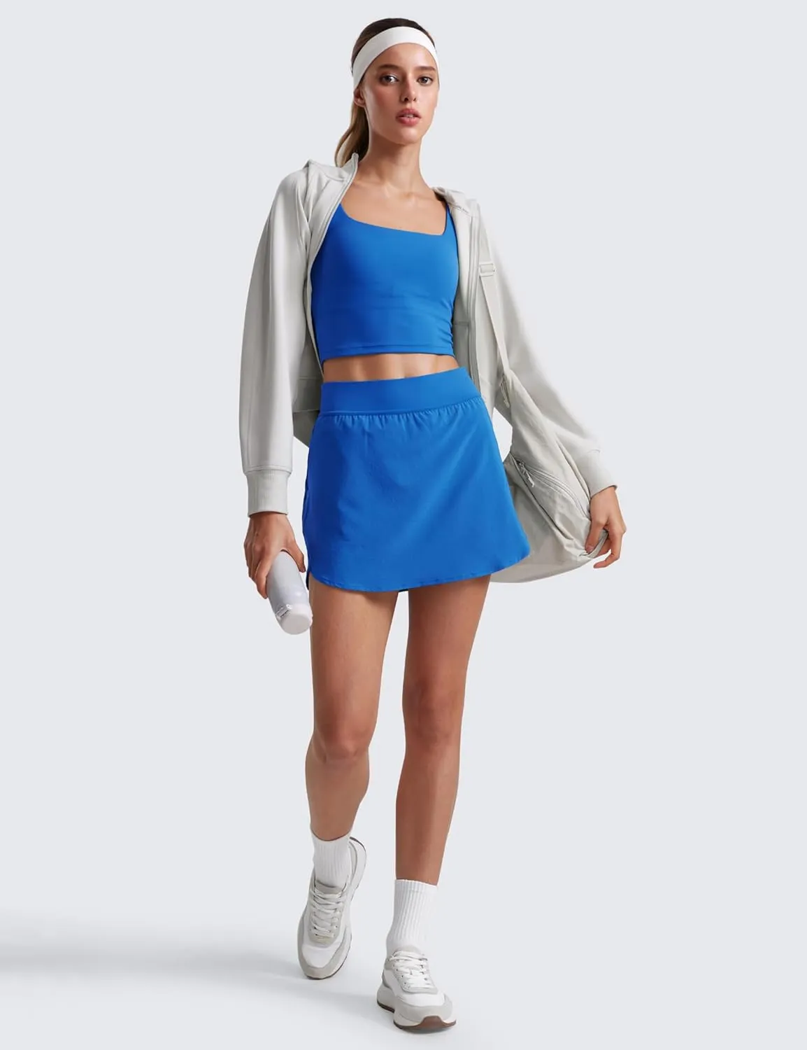 CRZ YOGA Dolphin Golf Skirts for Women A Line High Waisted Casual Athletic Mini Tennis Pickleball Skort with Zipper Pocket
