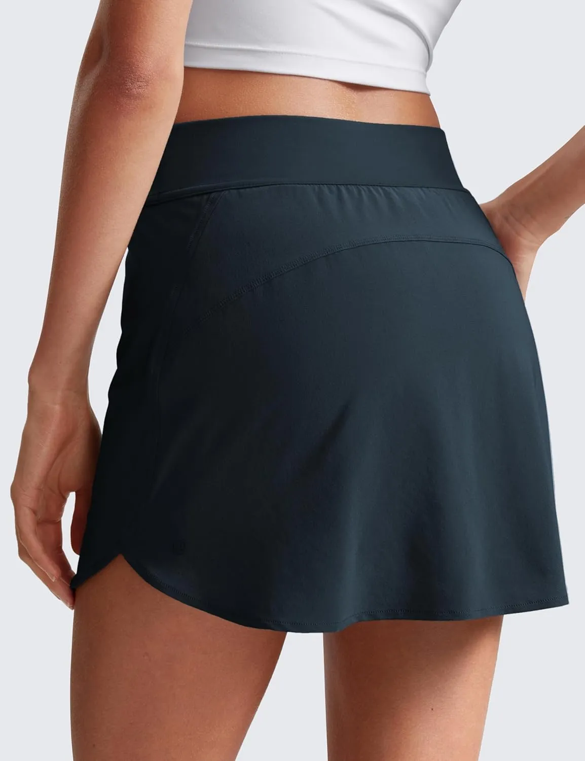 CRZ YOGA Dolphin Golf Skirts for Women A Line High Waisted Casual Athletic Mini Tennis Pickleball Skort with Zipper Pocket