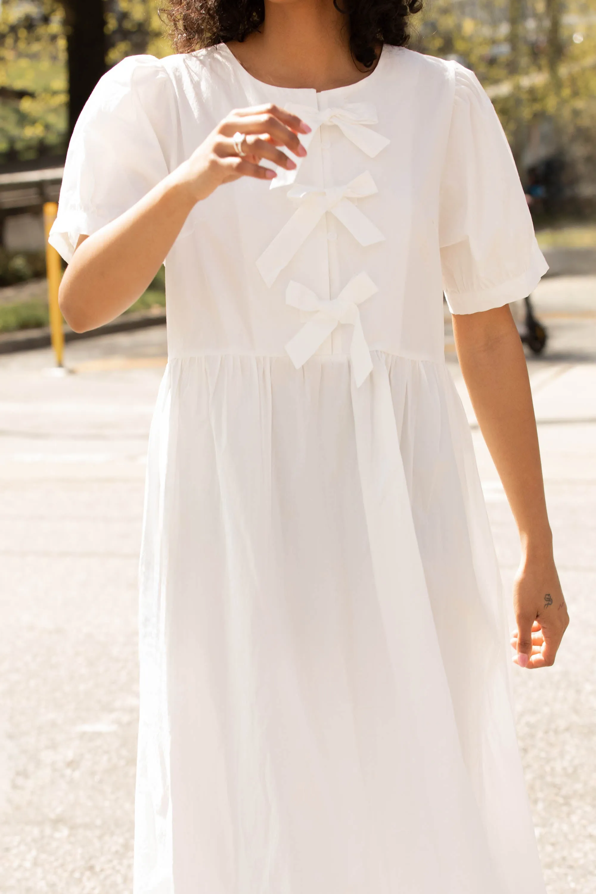 PUFF SLEEVE MIDI DRESS WITH BOWS